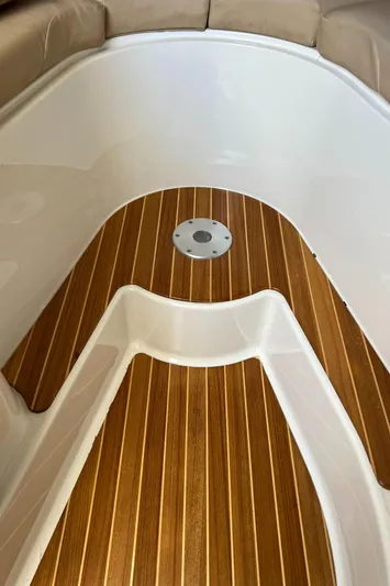 Pura Vida Yacht Photos Pics 2008 Hydra-Sports Vector 3500 VX boat interior with teak flooring.