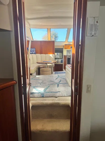 Why Wait Yacht Photos Pics Interior of 2000 Silverton 392 Motor Yacht featuring cozy seating area.