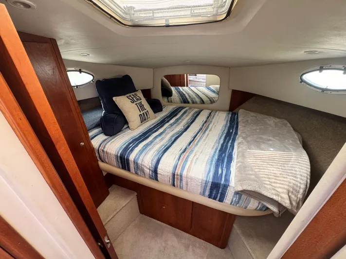 Why Wait Yacht Photos Pics Interior of 2000 Silverton 392 Motor Yacht with cozy bedroom.
