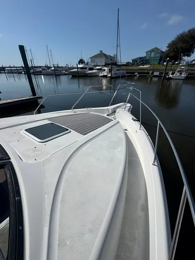 Why Wait Yacht Photos Pics 2000 Silverton 392 Motor Yacht docked on a sunny day.