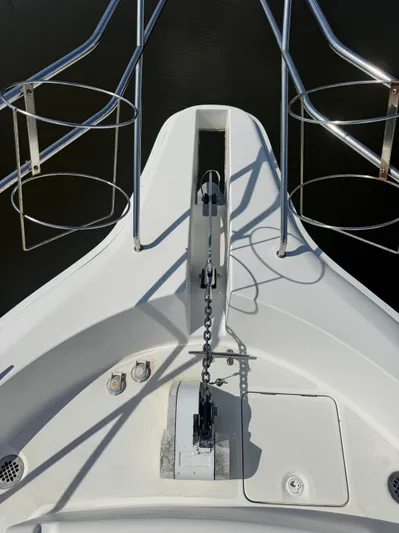 Why Wait Yacht Photos Pics Bow of 2000 Silverton 392 Motor Yacht with anchor windlass.