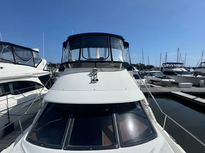 Why Wait Yacht Photos Pics 2000 Silverton 392 Motor Yacht docked in sunny marina.