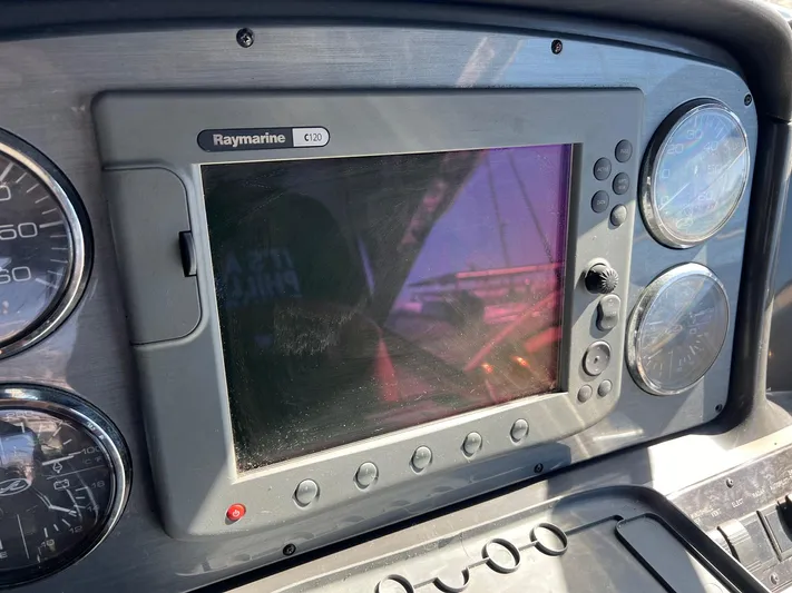  Yacht Photos Pics Control panel of a 2005 Sea Ray 390 Sundancer with Raymarine display and gauges.
