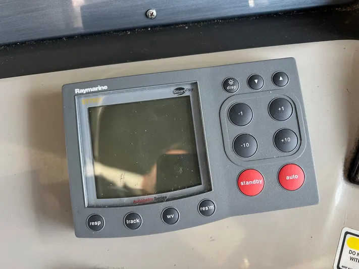  Yacht Photos Pics Raymarine autopilot control panel on 2005 Sea Ray 390 Sundancer yacht dashboard.