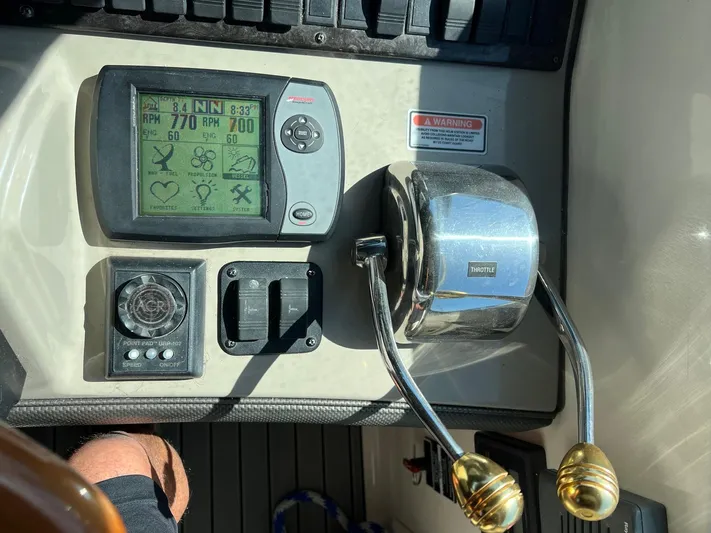  Yacht Photos Pics Control panel of a 2005 Sea Ray 390 Sundancer boat with navigation instruments.