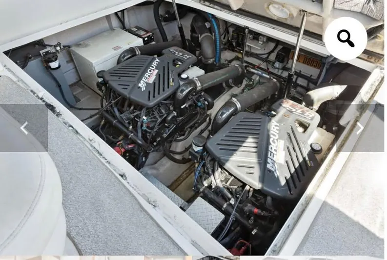  Yacht Photos Pics Engine compartment of a 2005 Sea Ray 390 Sundancer with dual Mercury engines.