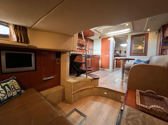  Yacht Photos Pics Interior of 2005 Sea Ray 390 Sundancer yacht, featuring cozy seating and modern amenities.