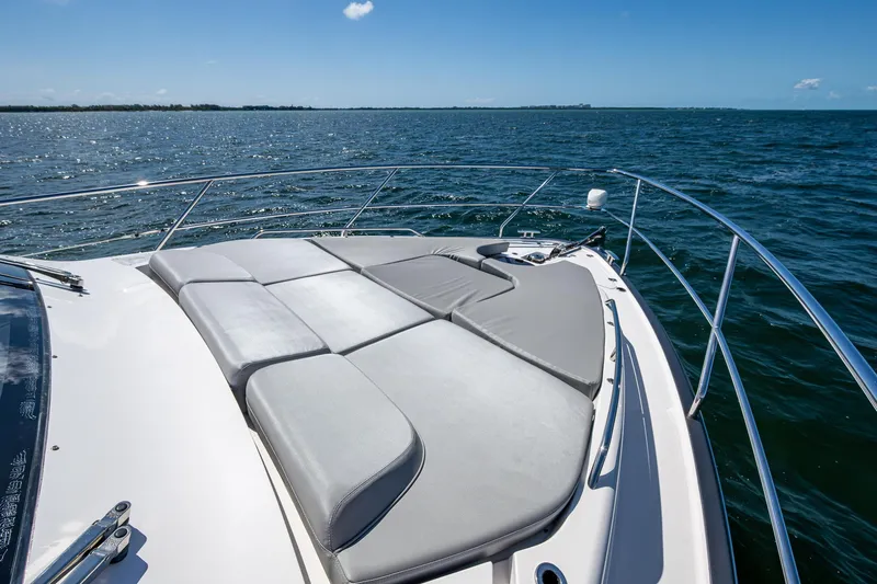 Suntastic Yacht Photos Pics 2023 Schaefer 450 yacht with sunbathing deck on open water.