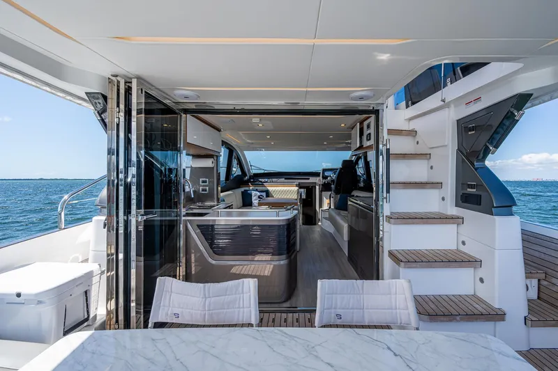 Suntastic Yacht Photos Pics Luxurious interior of 2023 Schaefer 450 yacht with modern design and ocean view.