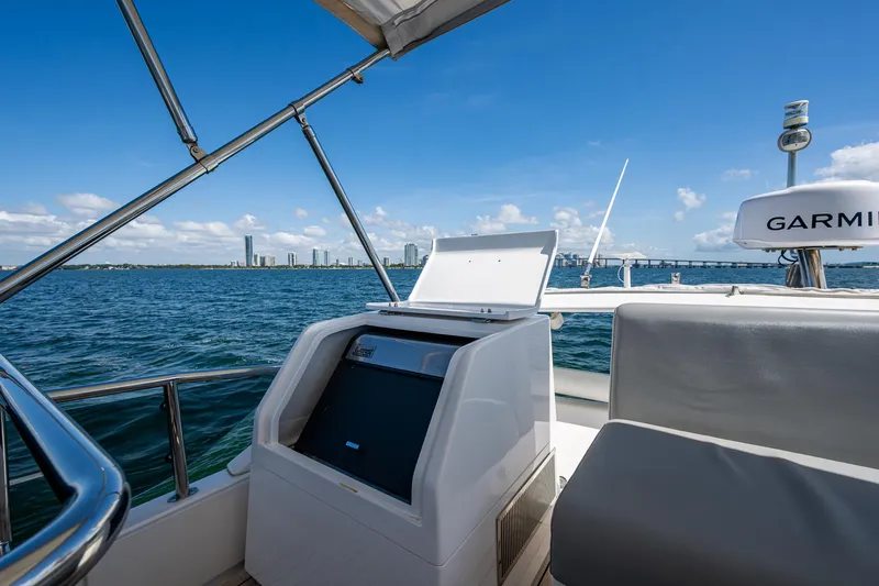 Suntastic Yacht Photos Pics Luxury Schaefer 450 yacht interior with ocean view, featuring modern navigation equipment, 2023 model.