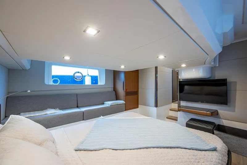 Suntastic Yacht Photos Pics Luxurious interior of 2023 Schaefer 450 yacht with modern furnishings and ambient lighting.
