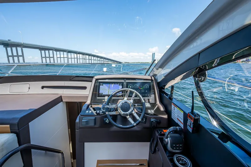 Suntastic Yacht Photos Pics Helm of 2023 Schaefer 450 yacht with bridge view and navigation equipment.