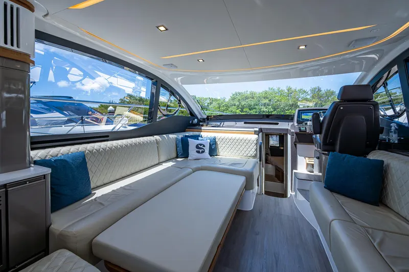 Suntastic Yacht Photos Pics Luxurious interior of 2023 Schaefer 450 yacht with elegant seating and modern design.