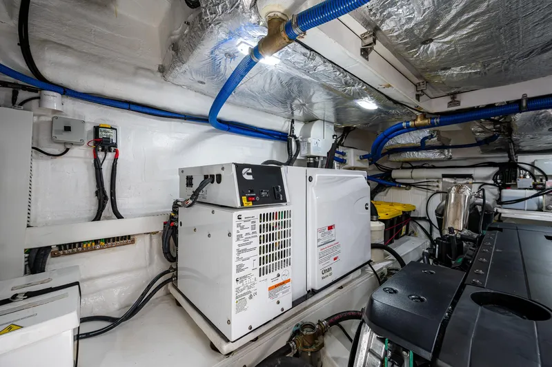 Suntastic Yacht Photos Pics Engine room of 2023 Schaefer 450 yacht with modern equipment and wiring.