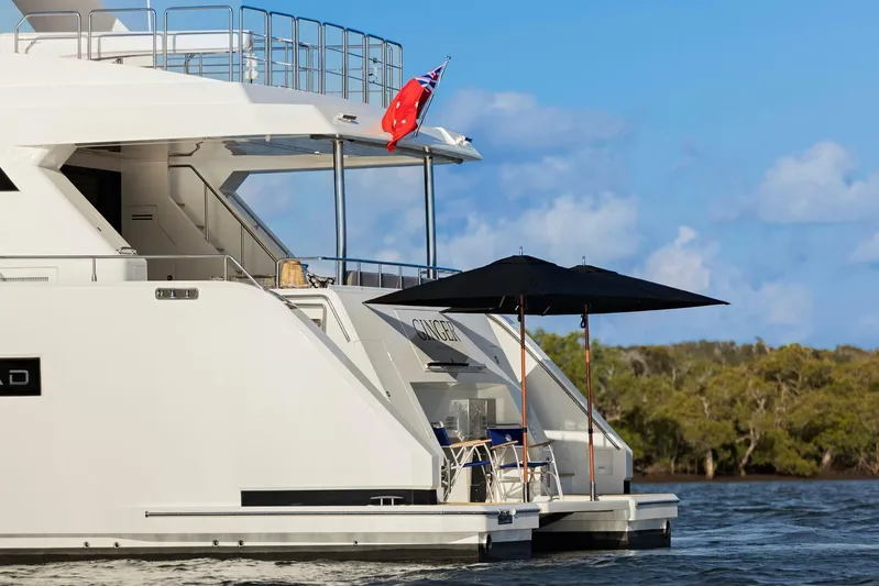 62 Iliad 2026 Yacht Photos Pics Luxury ILIAD 62 yacht, 2026 model, cruising with elegant design and outdoor seating.