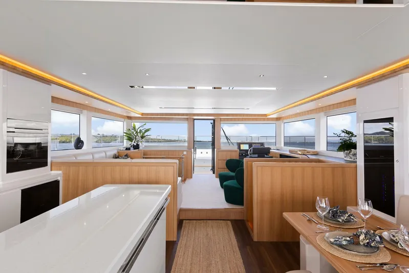62 Iliad 2026 Yacht Photos Pics Luxurious interior of 2026 ILIAD 62 yacht with modern design and panoramic windows.