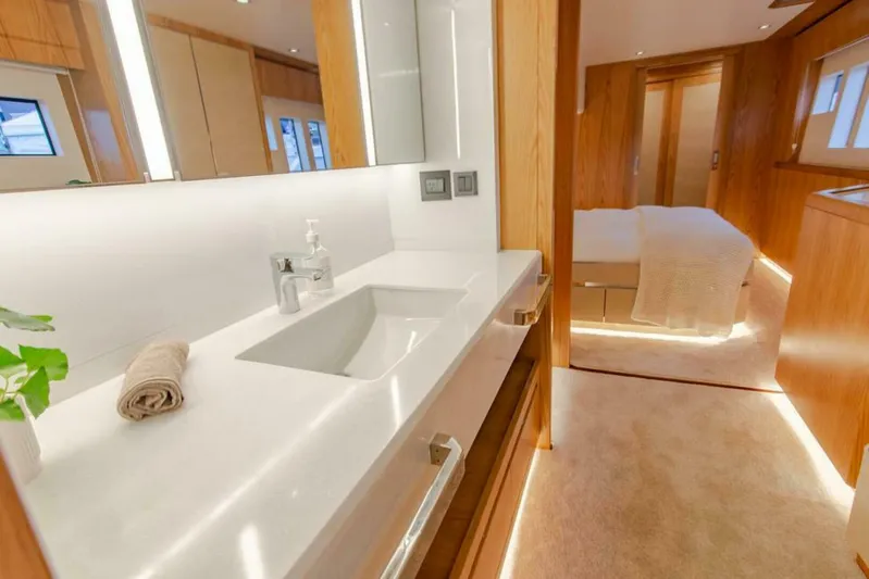 62 Iliad 2026 Yacht Photos Pics Luxurious yacht interior with modern bathroom and cozy bedroom, ILIAD 62, 2026 model.