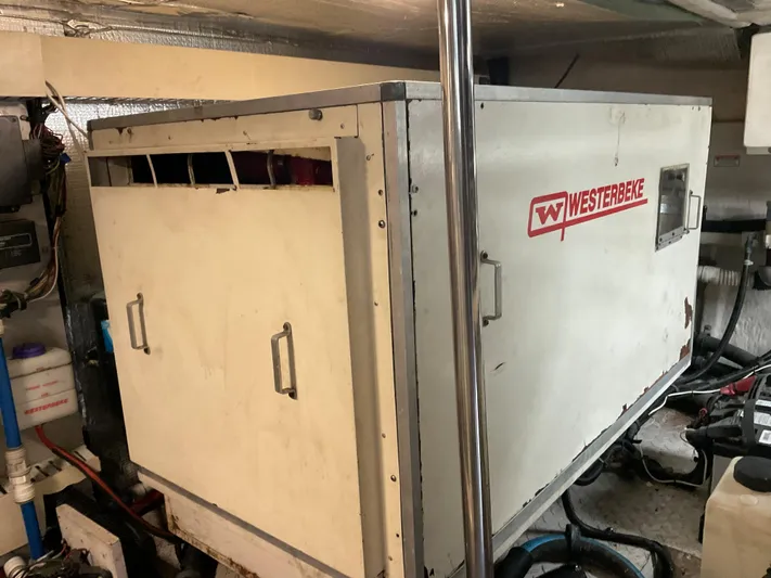  Yacht Photos Pics Westerbeke generator in 1999 Sea Ray 560 Sedan Bridge engine room.