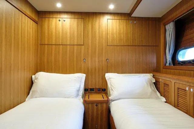  Yacht Photos Pics Twin cabin with wooden interior in 2026 Selene 72 Explorer yacht.