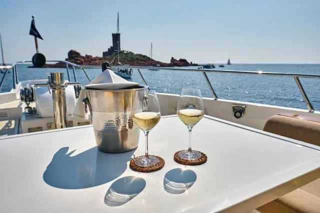  Yacht Photos Pics Luxury yacht Selene 72 Explorer with wine glasses and ice bucket, ocean view, 2026 model.