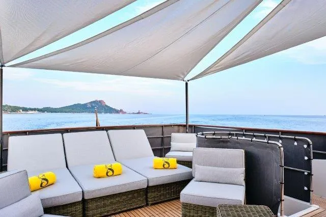  Yacht Photos Pics Luxurious Selene 72 Explorer yacht deck with seating, ocean view, and canopy, 2026 model.