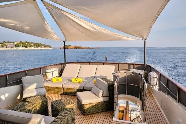  Yacht Photos Pics Luxurious deck of 2026 Selene 72 Explorer yacht with ocean view and comfortable seating.