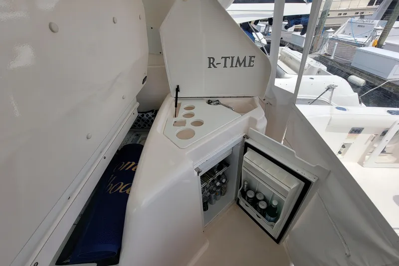 Radio Flyer Yacht Photos Pics 2005 Tiara Yachts 4400 Sovran with open mini fridge and cup holders on deck.