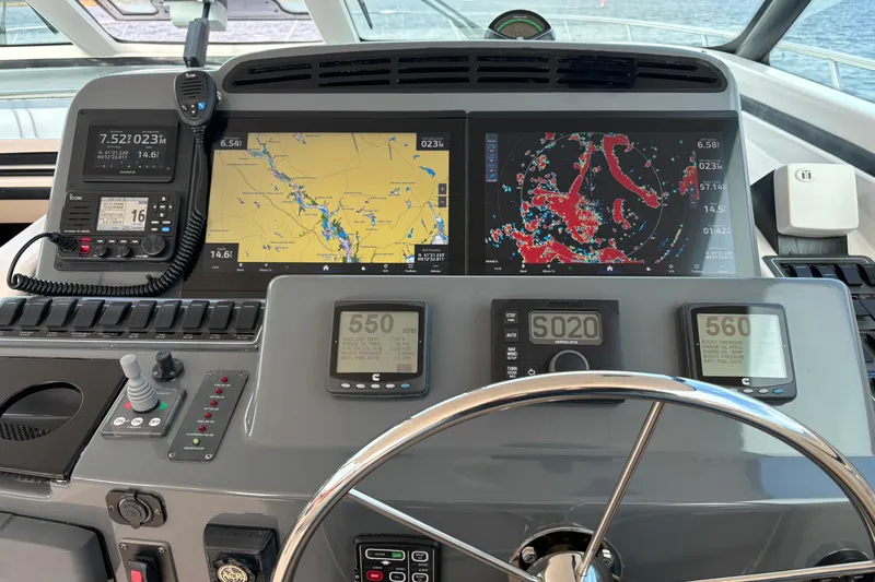 Radio Flyer Yacht Photos Pics Helm of 2005 Tiara Yachts 4400 Sovran with navigation and communication equipment.