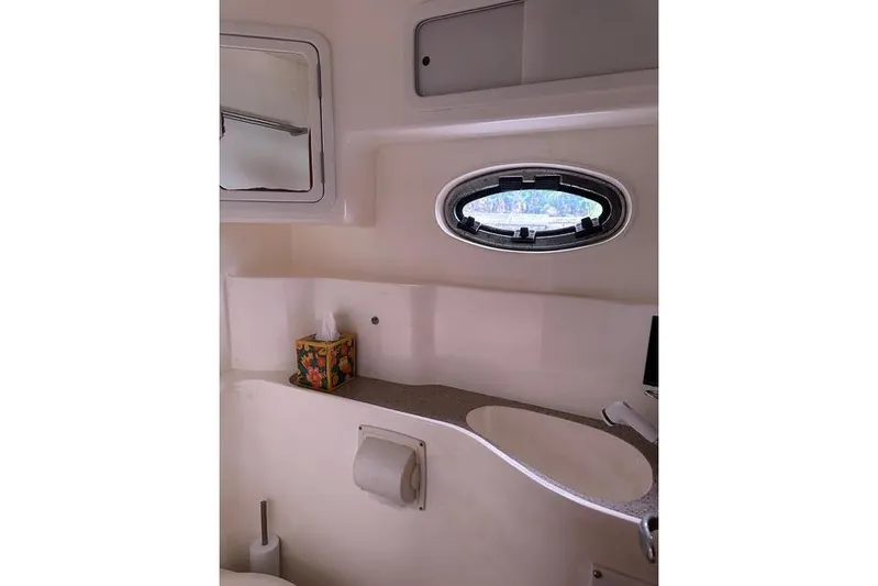 Sea Angel Yacht Photos Pics 2007 Africat Marine 420 yacht bathroom interior with porthole and sink.