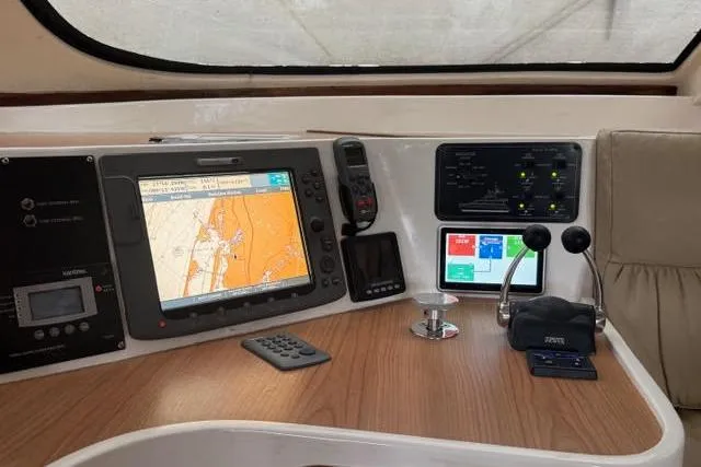 Sea Angel Yacht Photos Pics Helm of 2007 Africat Marine 420 with navigation equipment and controls.