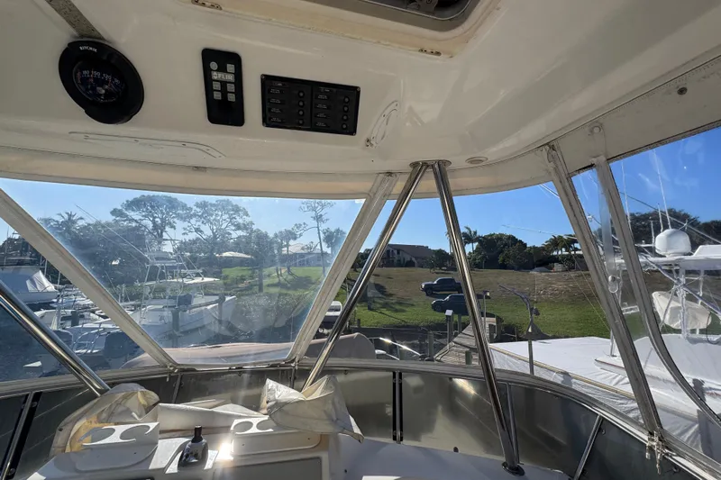 Sea Angel Yacht Photos Pics Interior view of 2007 Africat Marine 420 yacht with clear windows and control panel.