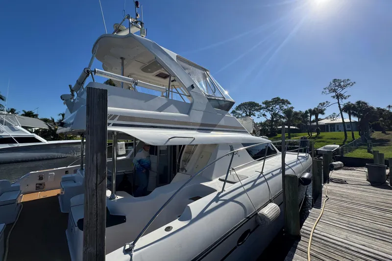 Sea Angel Yacht Photos Pics 2007 Africat Marine 420 yacht docked under clear blue sky.