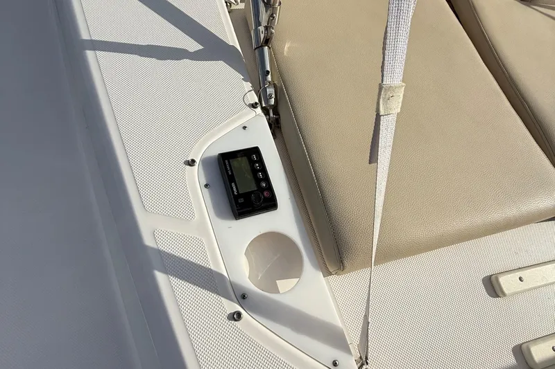 Tomtanic Yacht Photos Pics Control panel and seating area on 2019 Regal 42 Fly yacht deck.