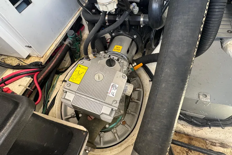 Tomtanic Yacht Photos Pics Engine compartment of a 2019 Regal 42 Fly boat, showcasing mechanical components and wiring.