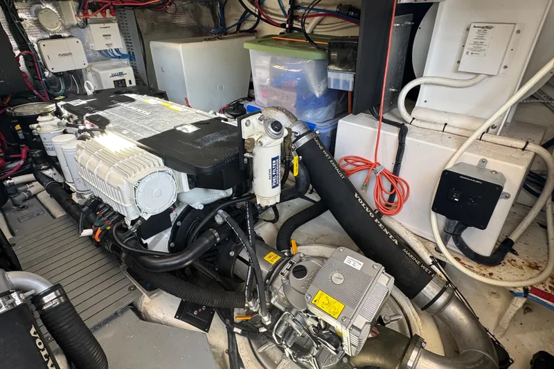 Tomtanic Yacht Photos Pics Engine room of a 2019 Regal 42 Fly yacht, featuring Volvo Penta components.