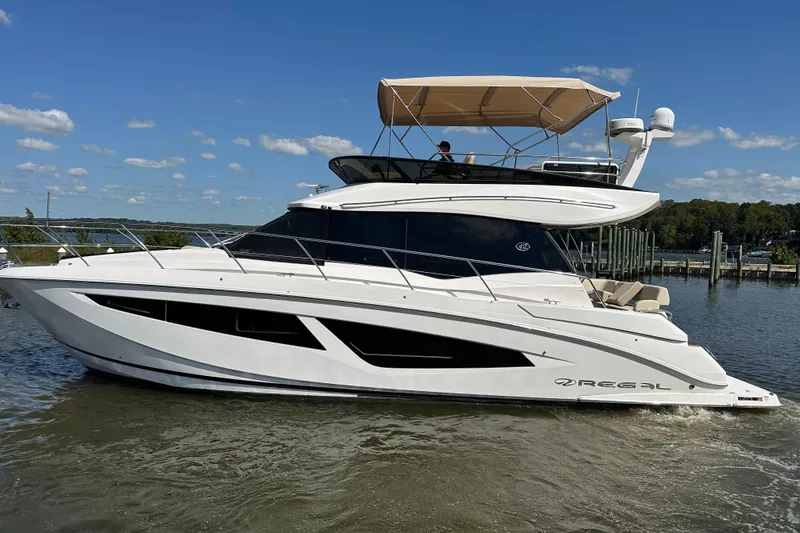Tomtanic Yacht Photos Pics 2019 Regal 42 Fly yacht cruising on a sunny day.