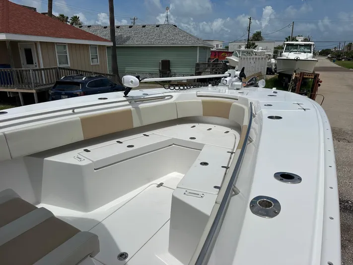  Yacht Photos Pics 2023 Cape Horn 32xs boat with spacious seating and modern design in a coastal setting.