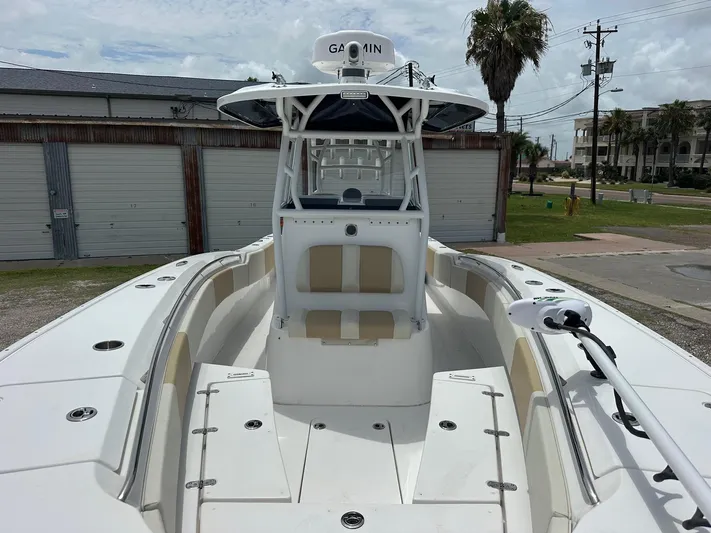  Yacht Photos Pics 2023 Cape Horn 32xs boat with Garmin equipment, docked near storage units.