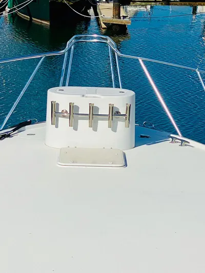  Yacht Photos Pics Bow of 2001 Hatteras 60 Convertible yacht at marina.