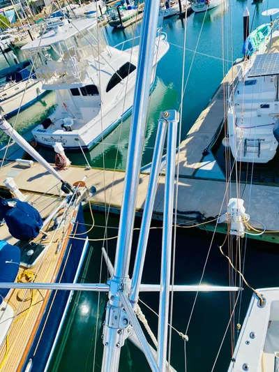  Yacht Photos Pics Aerial view of a 2001 Hatteras 60 Convertible yacht docked in a marina.