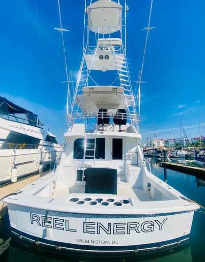  Yacht Photos Pics Hatteras 60 Convertible 2001 yacht "Reel Energy" docked in marina, Wilmington, DE.