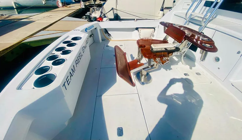  Yacht Photos Pics 2001 Hatteras 60 Convertible yacht deck with fishing chair and rod holders.