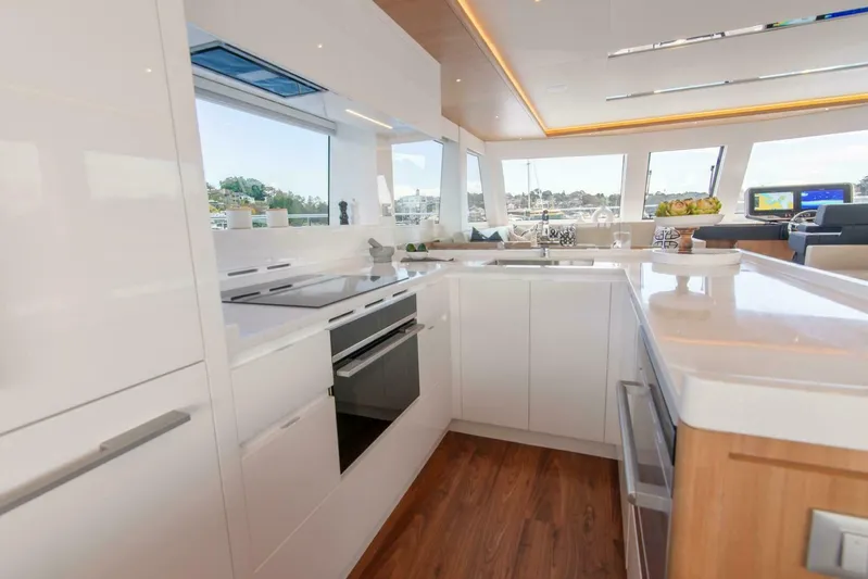53e Iliad 2026 Yacht Photos Pics Luxurious kitchen interior on 2026 ILIAD 53E yacht, featuring modern appliances and sleek design.