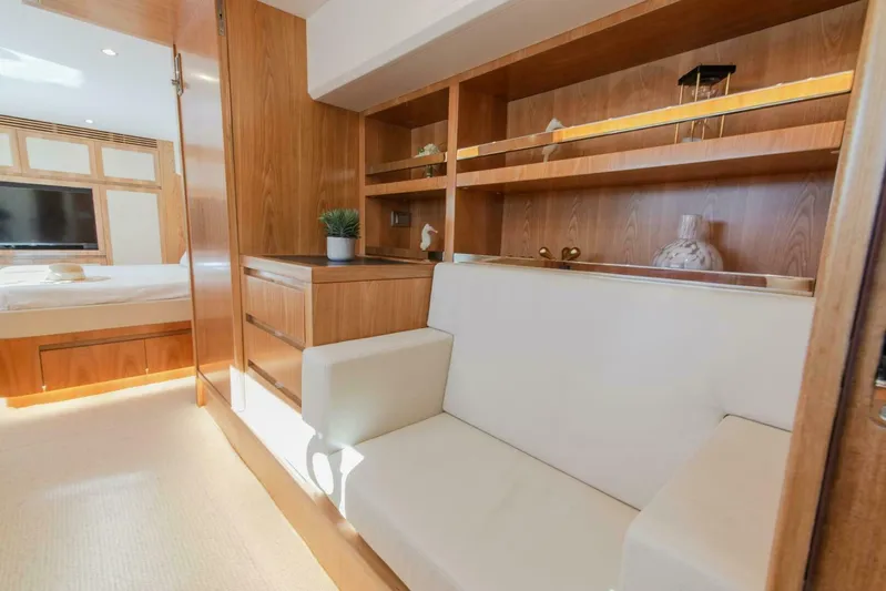 53e Iliad 2026 Yacht Photos Pics Luxurious interior of ILIAD 53E yacht, featuring elegant wood finishes and modern furnishings, 2026 model.