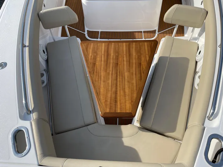  Yacht Photos Pics Luxurious seating area on 2019 Everglades 435 CC boat with teak flooring.