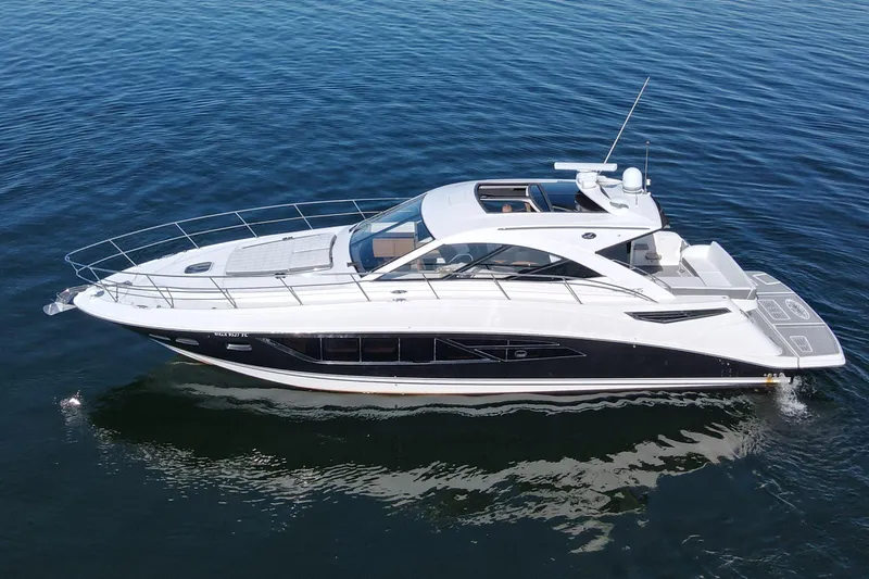 Livin Da Lyfe Yacht Photos Pics 2013 Sea Ray 510 Sundancer yacht cruising on calm blue waters.