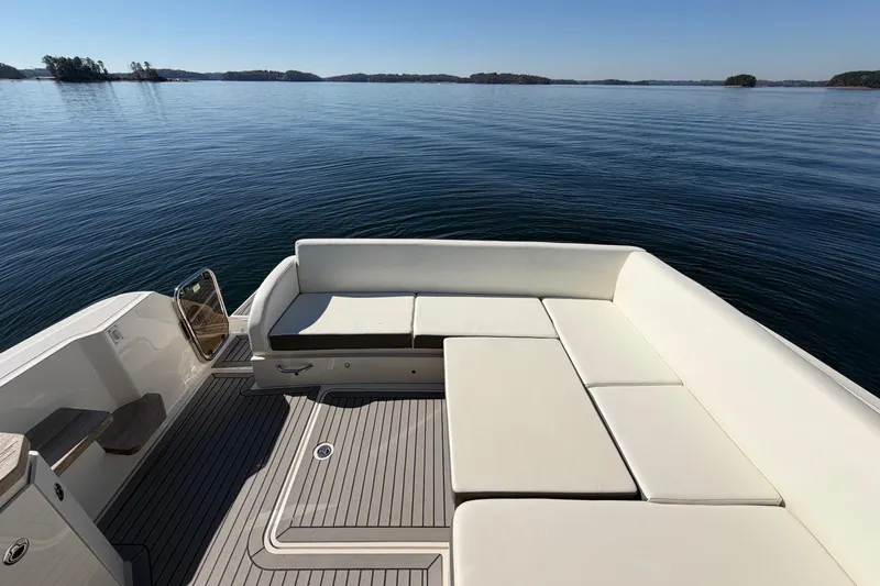 Livin Da Lyfe Yacht Photos Pics Luxurious 2013 Sea Ray 510 Sundancer yacht with spacious deck seating on calm waters.