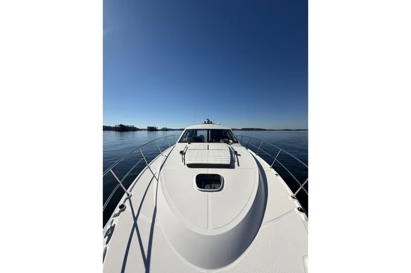 Livin Da Lyfe Yacht Photos Pics 2013 Sea Ray 510 Sundancer yacht cruising on calm waters under clear blue skies.