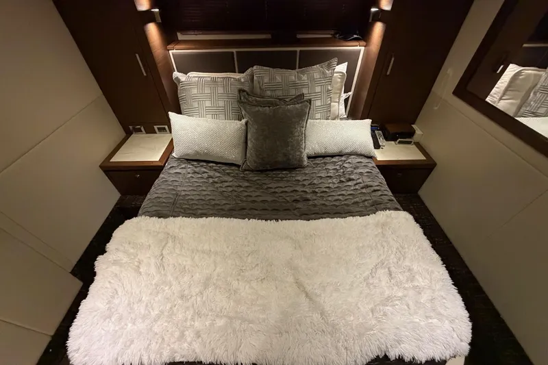 Livin Da Lyfe Yacht Photos Pics Luxurious bedroom interior of 2013 Sea Ray 510 Sundancer yacht with plush bedding.