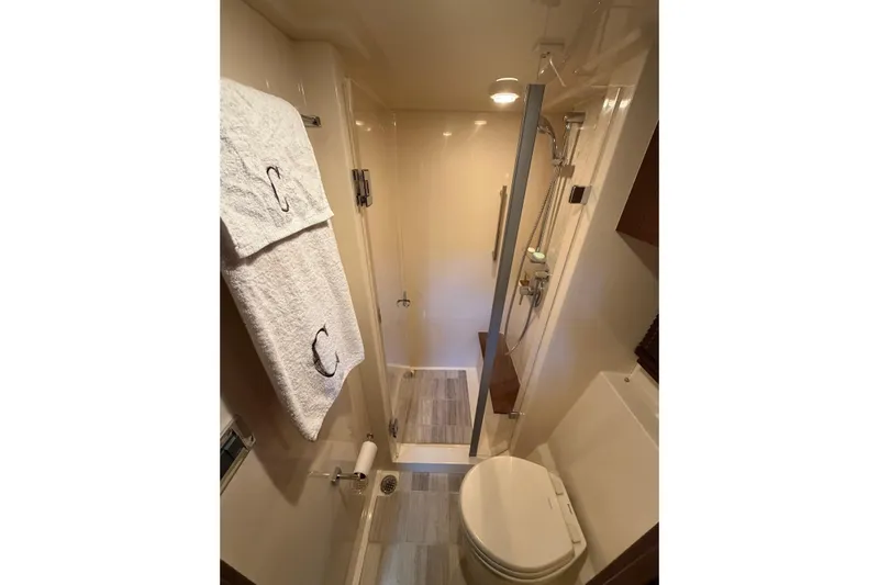 Livin Da Lyfe Yacht Photos Pics Luxurious bathroom in 2013 Sea Ray 510 Sundancer yacht with shower and toilet.